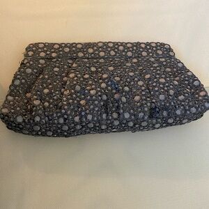 Club Monaco grey silk and metal “eyelet” clutch